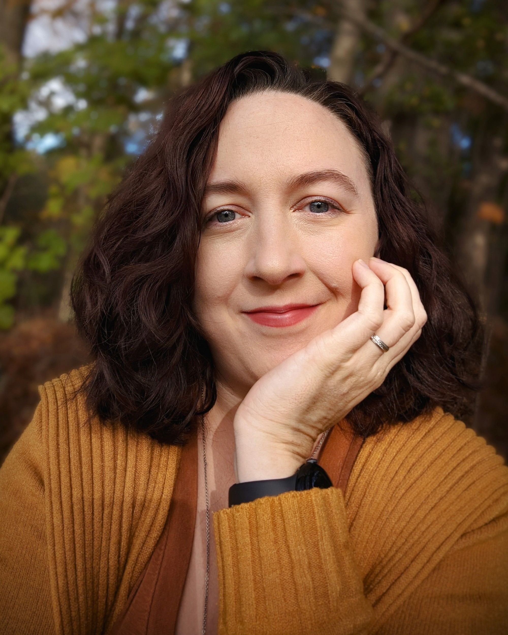 Portrait fo nicole taken outside in the spring.